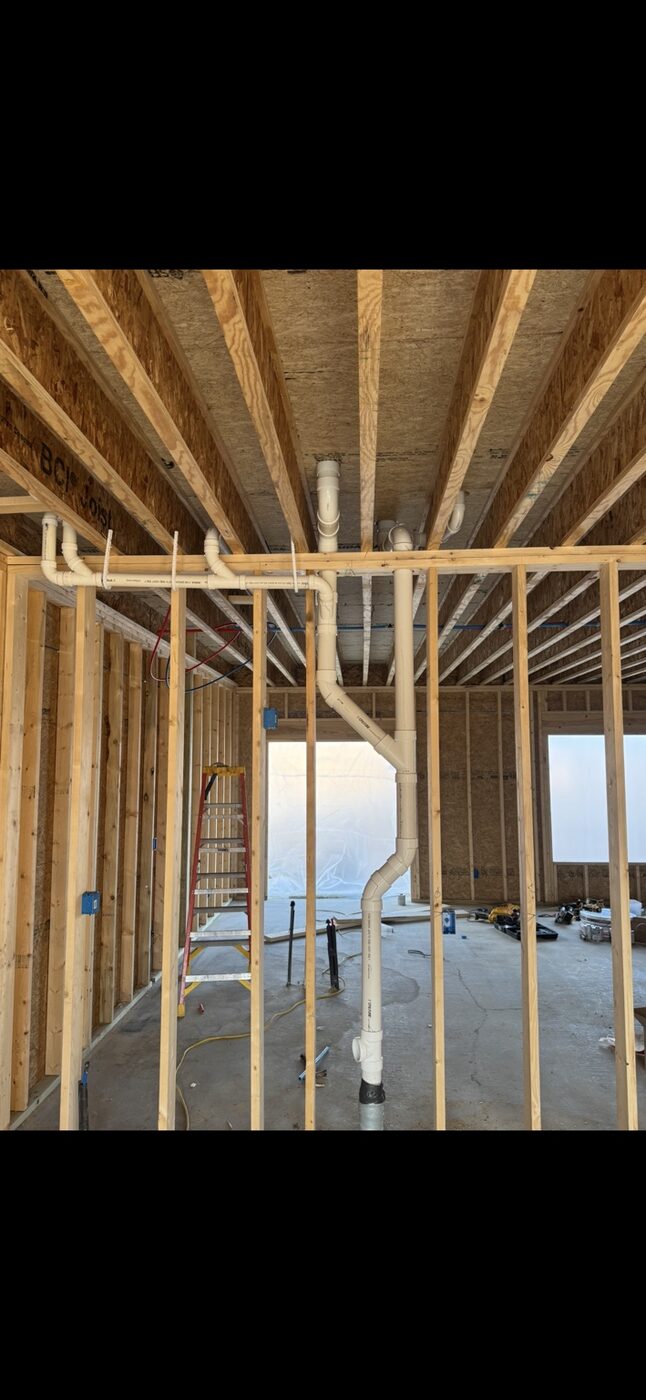 Residential plumbing rough-in inside framed construction